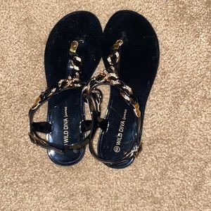 Black and gold sandals